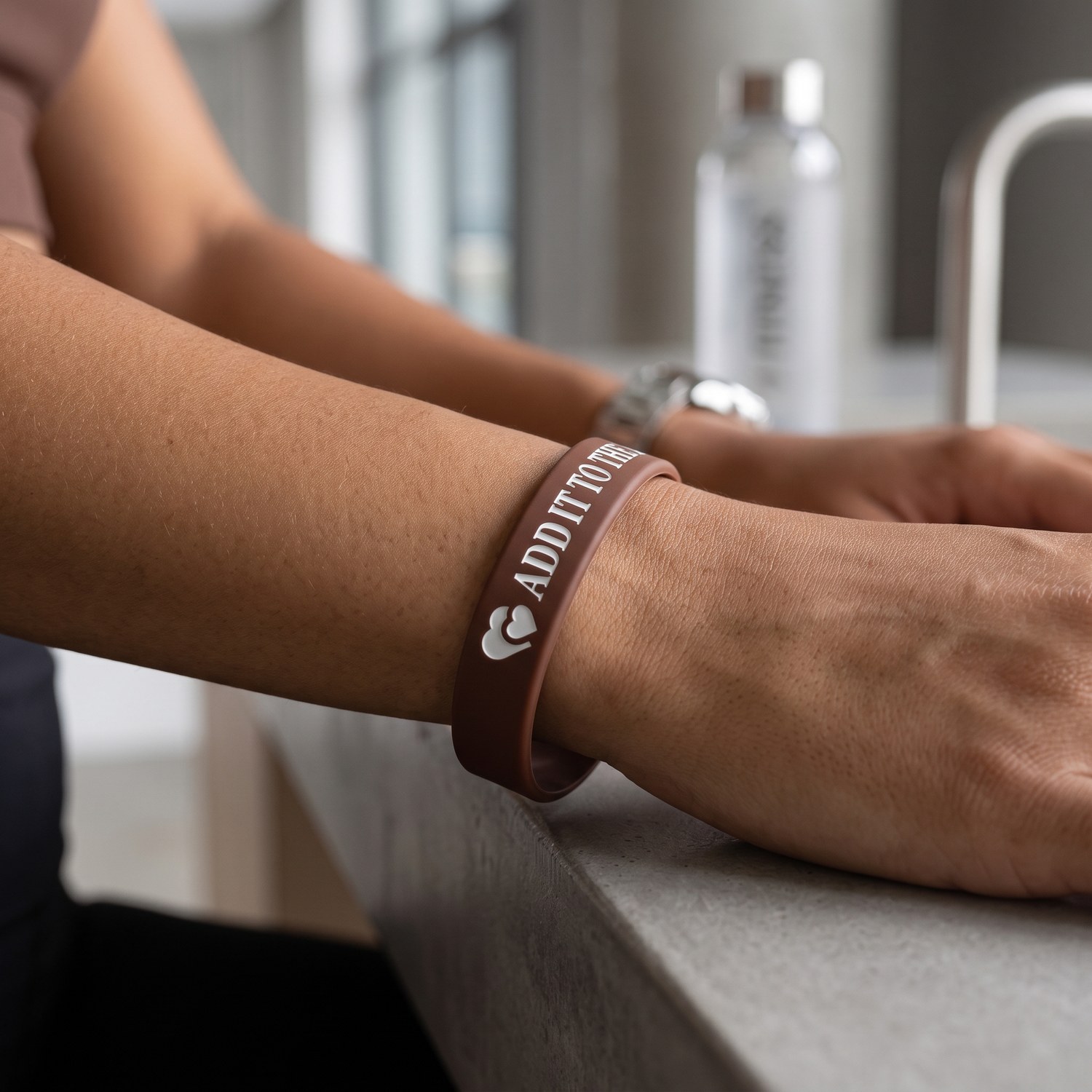 Add It To The Bag silicone wristband on a wrist